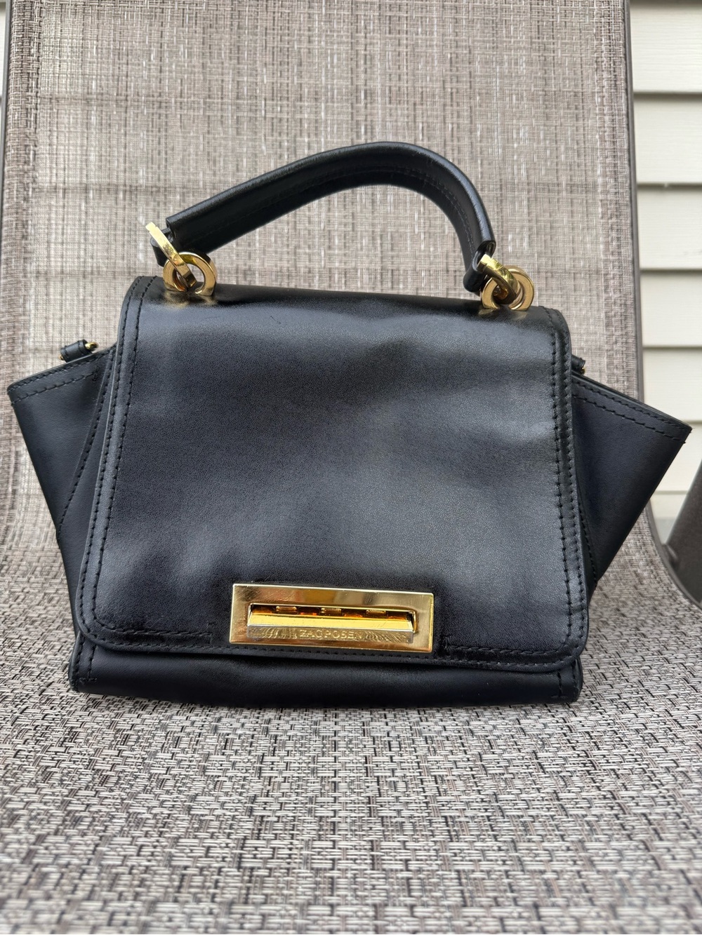 Black Leather Top-Handle Women's Bag with Gold Hardware